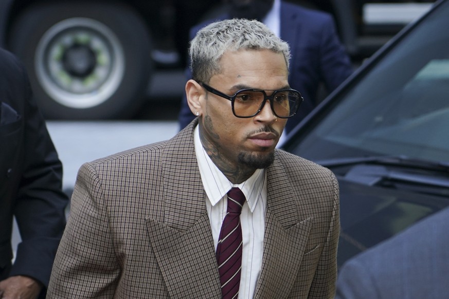 Grammy-winning singer Chris Brown makes his way into Southwark Crown Court, in London, Friday, July 11, 2025.(AP Photo/Alberto Pezzali)
----------------